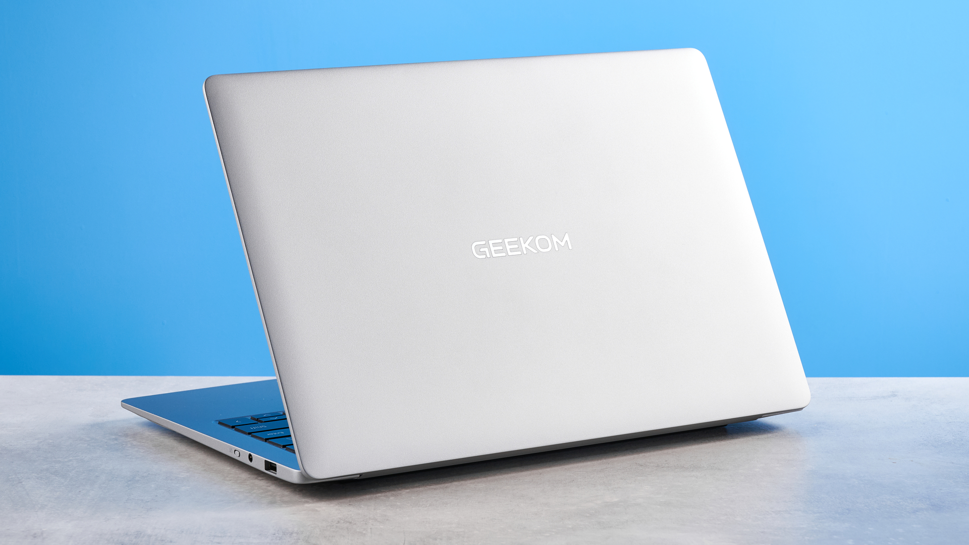 A silver Geekom GeekBook X14 Pro Windows laptop