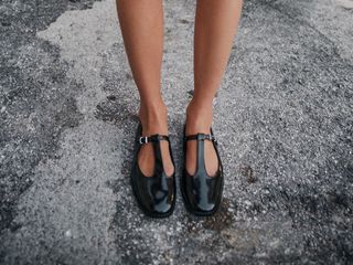 Model wearing Zara T-strap Mary Janes.