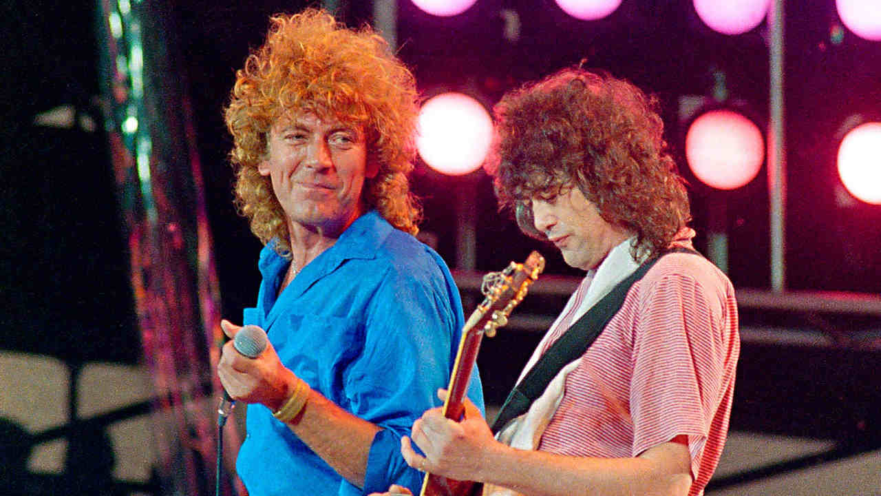 Led Zeppelin’s Jimmy Page and Robert Plant performing onstage at LIve Aid