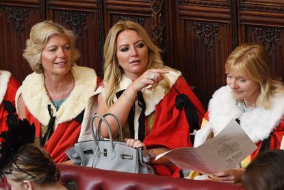 Baroness Mone (centre) ahead of the State Opening of Parliament by Queen Elizabeth II, in the House of Lords at the Palace of Westminster in London. PRESS ASSOCIATION Photo. Picture date: Wednesday June 21, 2017. See PA story POLITICS Speech. Photo credit should read: Stefan Rousseau/PA Wire