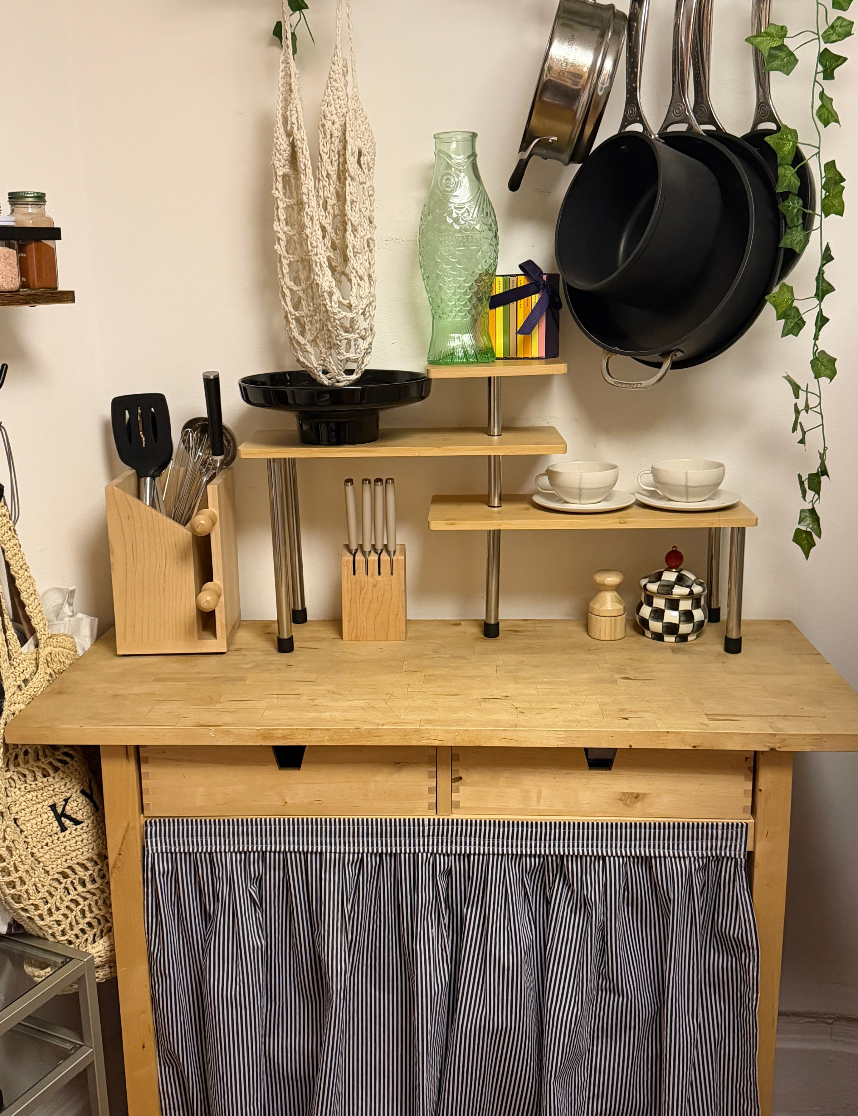 IKEA kitchen trolley styled with a striped linen skirt and various kitchen essentials
