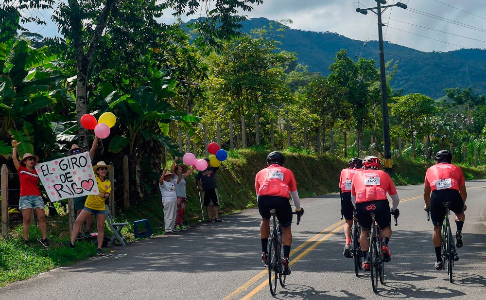 Amateur cyclist ride during the Giro de Rigo as fan cheers in San Carlos, Antioquia's Department, on November 4, 2018