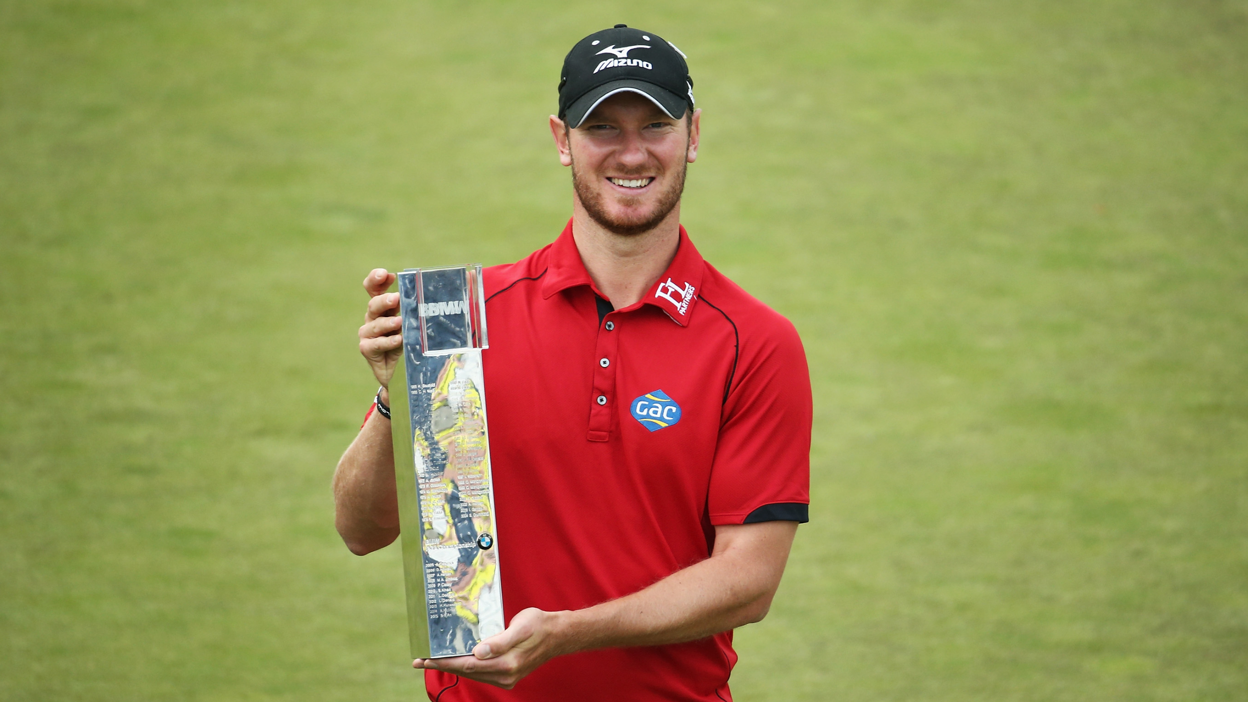 Chris Wood with the BMW PGA Championship trophy