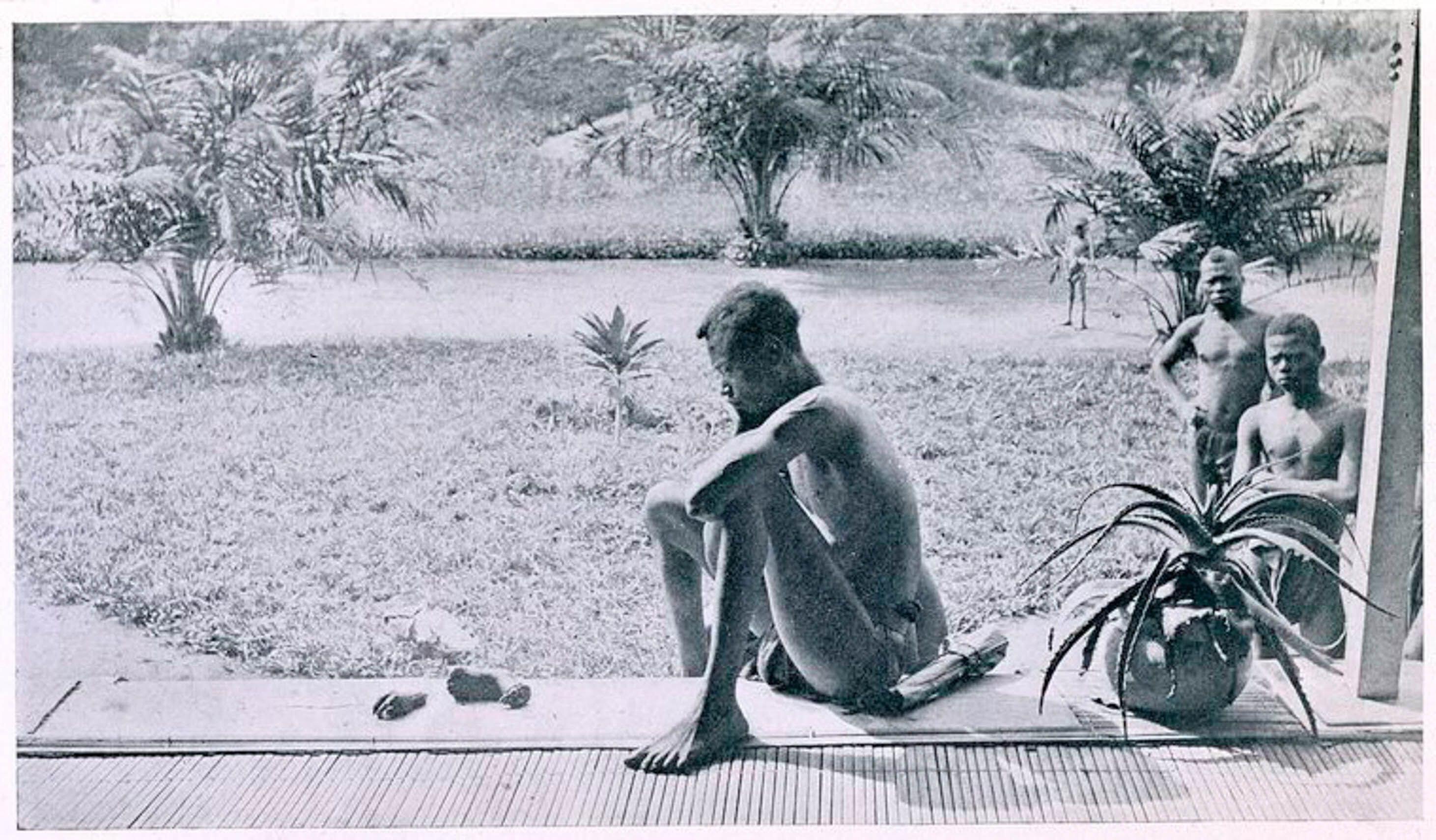 Alice Seeley Harris' photo of a father looking at the severed hand and foot of his five-year-old daughter. Her photos helped to expose the abuses in the Congo