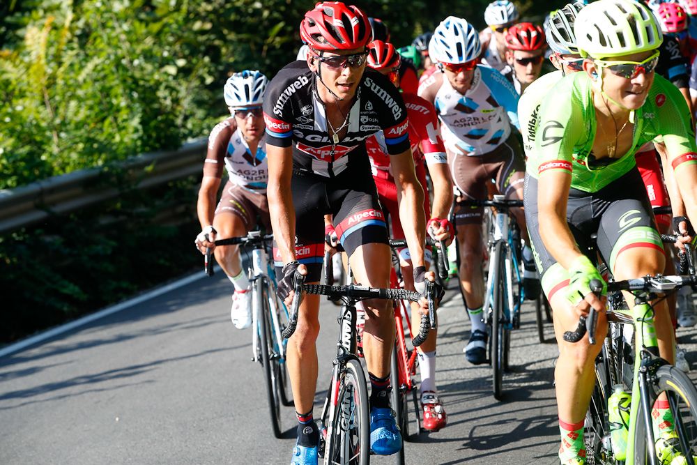 Warren Barguil climbs in the bunch during Milano-Torino