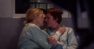 Bernie Wolfe and Serena Campbell kiss