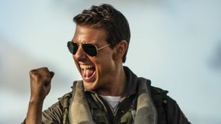 Tom Cruise celebrates in Top Gun: Maverick