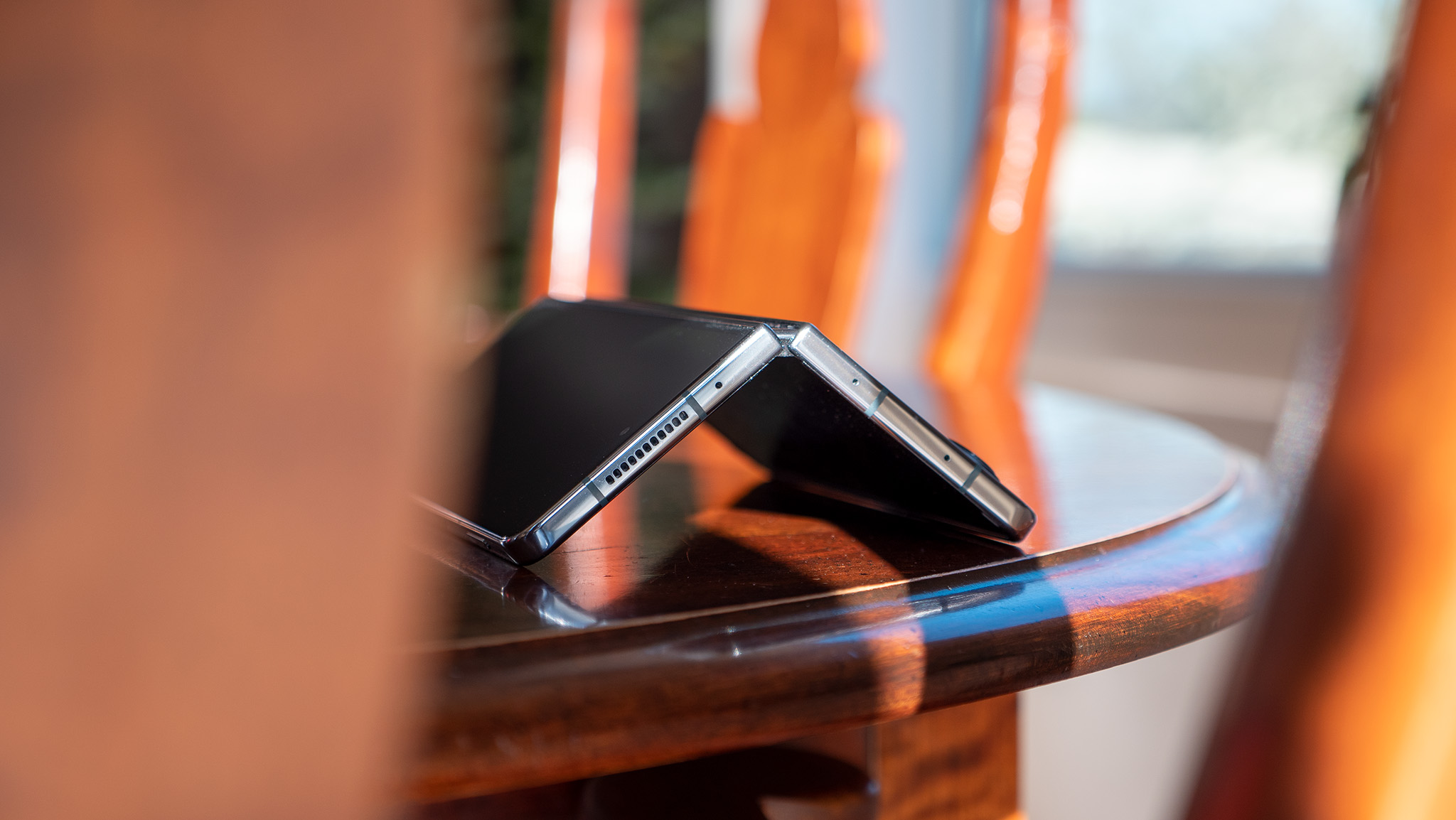 Samsung Galaxy Z Fold 4 in flex mode tenting on a table