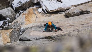 Aerial view of rock climber on wall
