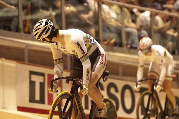 Anna Meares from Australia checks on the whereabouts of Great Britain's Victoria Pendleton during the ride for the gold medal in the women's sprint.
