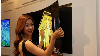 Could LG's 'wallpaper' OLED TVs challenge laser TVs?