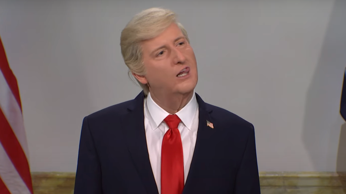 James Austin Johnson cocks his head to the side and sticks his tongue out during an impersonation of Donald Trump on SNL.