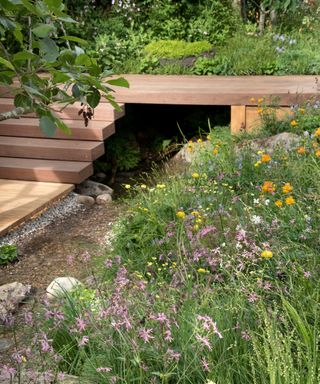 decked steps with planting at The Meta garden; Growing the Future by Joe Perkins