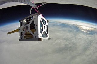 This NASA photo shows the compact PhoneSat 1.0 nanosatellite during high-altitude balloon test.