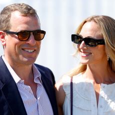 Peter Phillips and Harriet Sperling wearing sunglasses and smiling