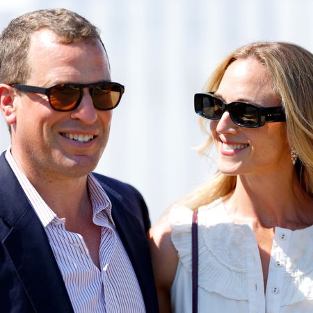 Peter Phillips and Harriet Sperling wearing sunglasses and smiling