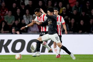 Cody Gakpo of PSV, Takehiro Tomiyasu of Arsenal during the UEFA Europa League match between PSV v Arsenal at the Philips Stadium on October 27, 2022 in Eindhoven Netherlands