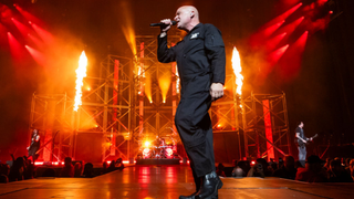 David Draiman of the band Disturbed performs during The Sickness 25th Anniversary Tour at Little Caesars Arena on March 10, 2025 in Detroit, Michigan. 