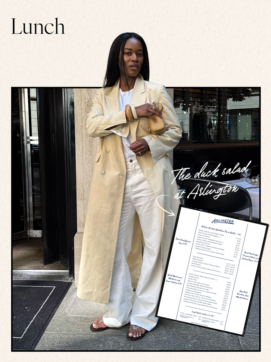 Woman in pale yellow coat and white jeans