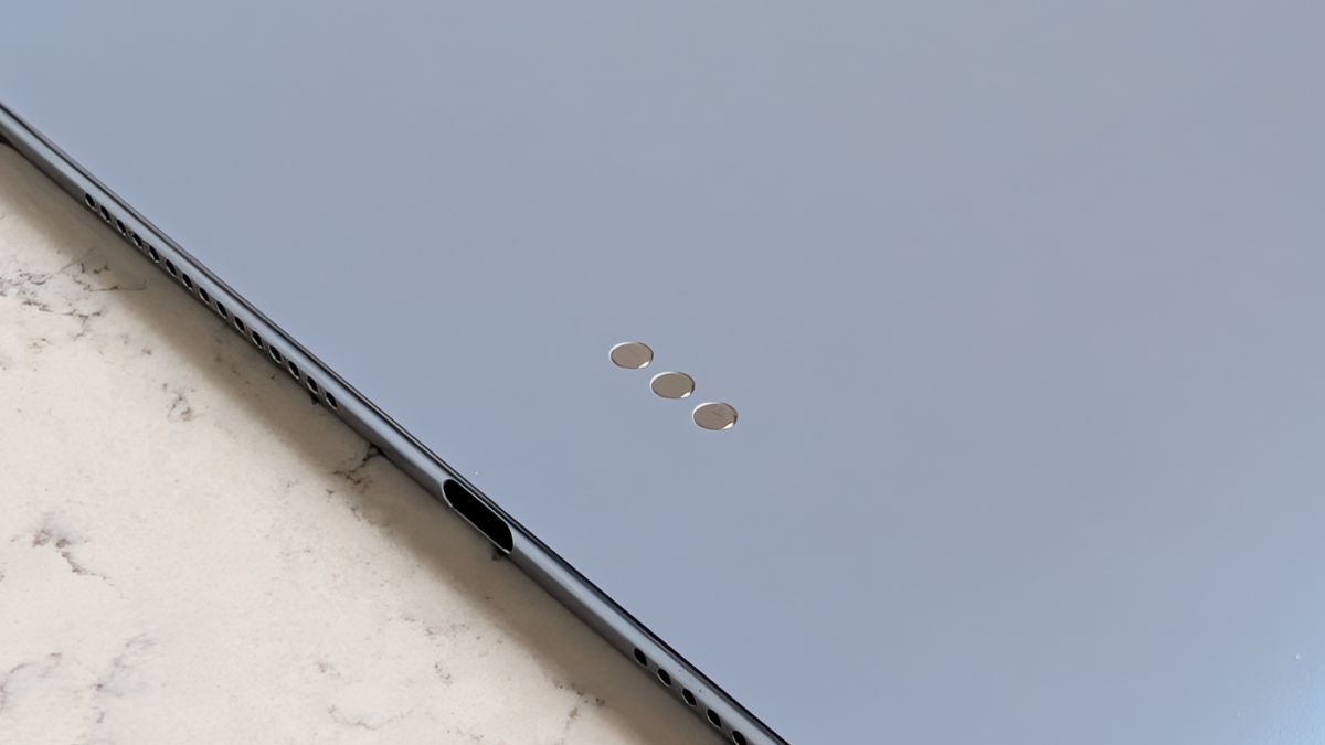 Photos of the Huawei MatePad Pro Max resting on a marble table