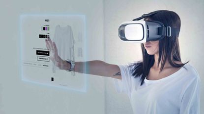 Futuristic photo of a woman using virtual reality to shop for clothes