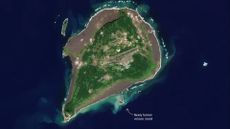 An aerial view of a volcanic island as it forms off the coast of Iwo Jima.