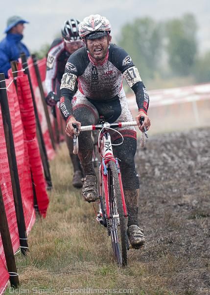 Jake Wells (Stan's NoTubes Elite Cyclocross Team) tries to find some firmer ground along the fence.