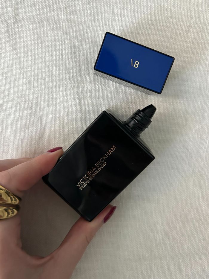 Junior beauty editor Grace Lindsay holding the Victoria Beckham foundation