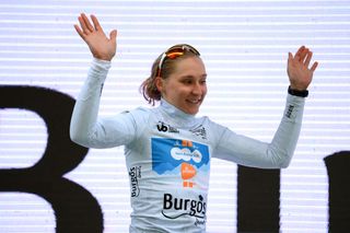 BURGOS SPAIN MAY 16 Megan Jastrab of The United States and Team dsmfirmenich PostNL celebrates at podium as White best young jersey winner during the 9th Vuelta a Burgos Feminas 2024 Stage 1 a 123km stage from Villagonzalo Pedernales to Burgos UCIWWT on May 16 2024 in Burgos Spain Photo by Alex BroadwayGetty Images