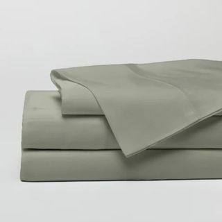 Cozy Earth Bamboo Sheets against a gray background.