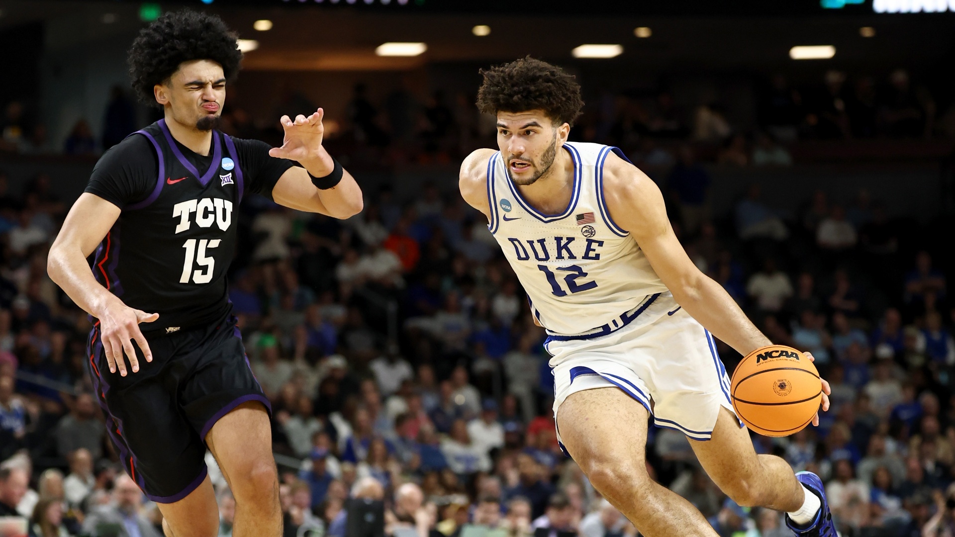 Cameron Boozer of the Duke Blue Devils driving to the basket at March Madness 2026