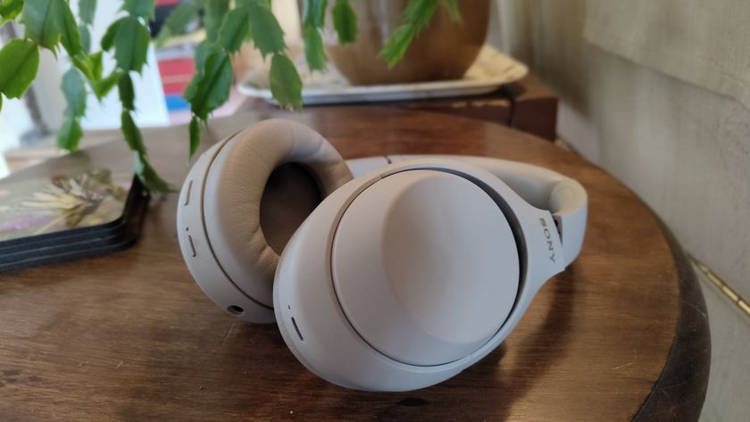 Sony WH-1000XM4 on a table with a plant 