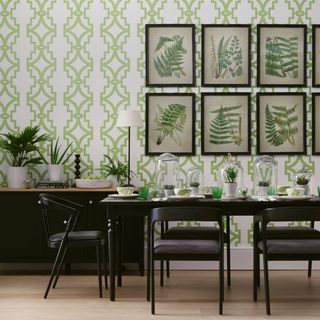 dining room with botanical theme wall