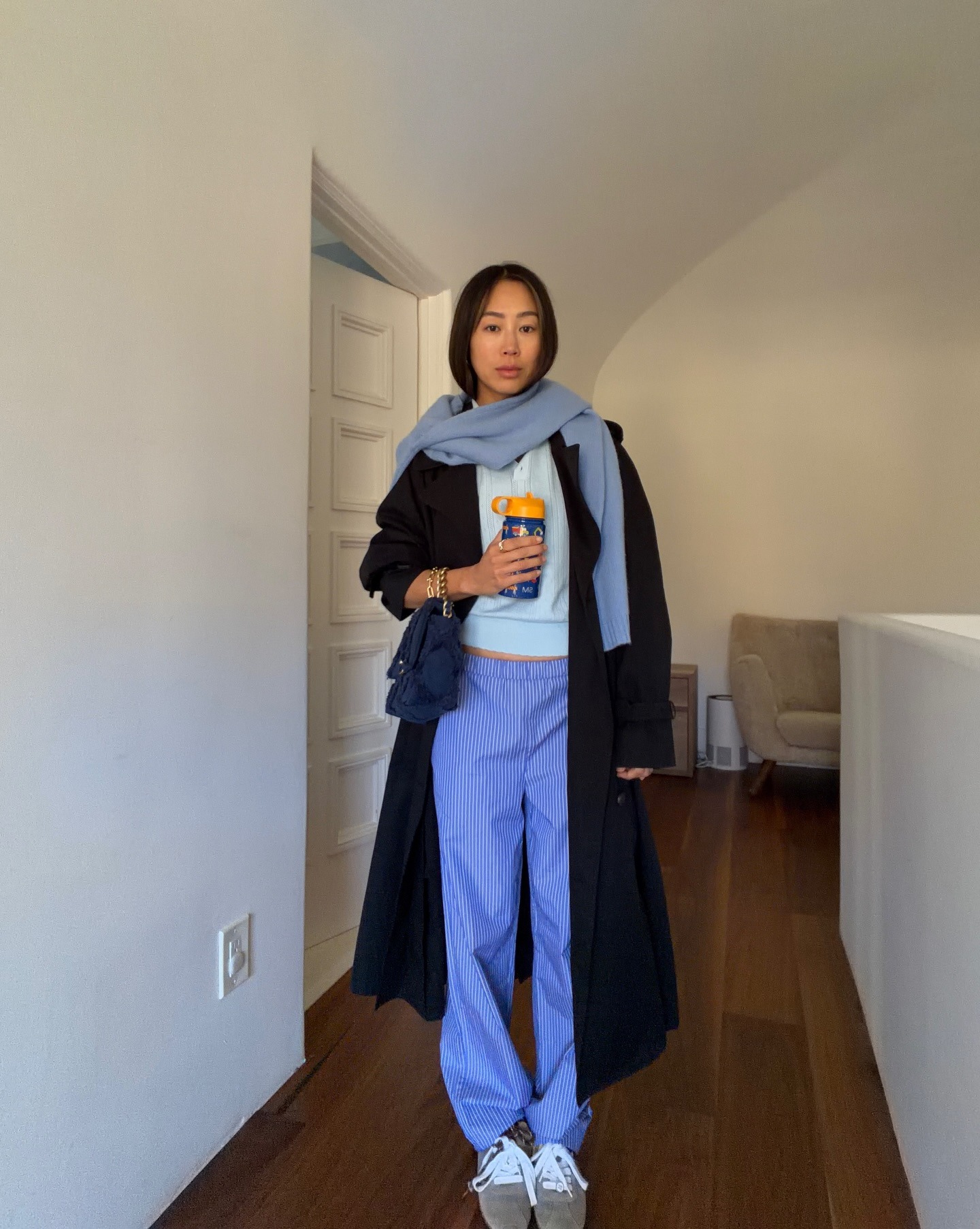 Influencer wearing sneakers with poplin pull-on pants