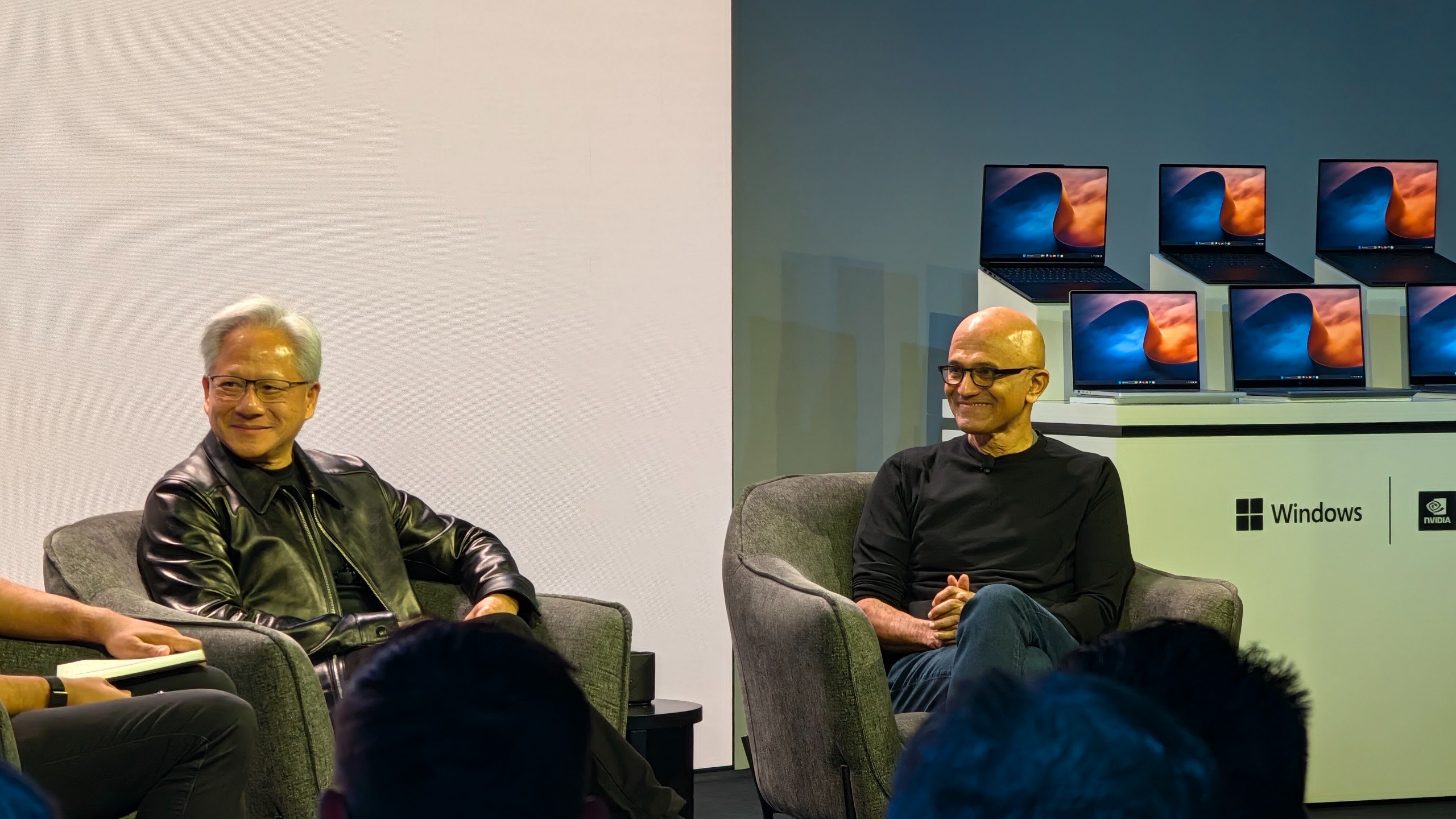 Jensen and Nadella on stage at Microsoft Surface Laptop Ultra event