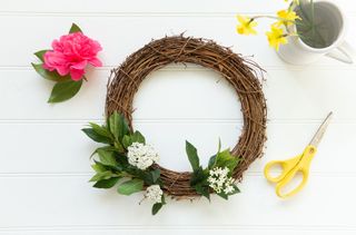 Add some flowering shrubs to the easter wreath
