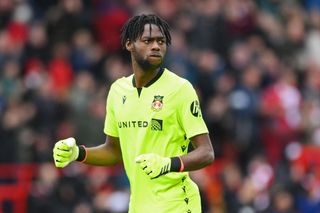 Arthur Okonkwo of Wrexham celebrates his team's first goal during the Sky Bet League Two match between Wrexham and Stockport County at Racecourse Ground on April 27, 2024 in Wrexham, Wales.