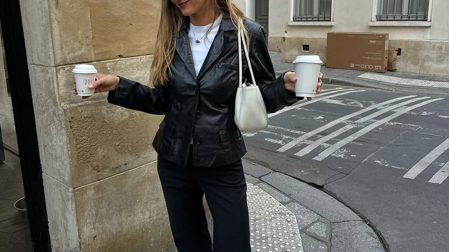 Anne Laure Mais in a leather blazer and trousers.