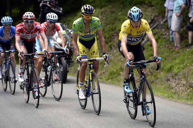 Team Sky's Chris Froome leads a select group of climbers up the final climb of stage two