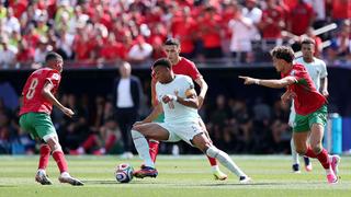 FOXBOROUGH, MASSACHUSETTS - JULY 09: Kylian Mbappe #10 of France controls the ball against Azzedine Ounahi #8, Bilal El Khannouss #23 and Neil El Aynaoui #24 of Morocco during the FIFA World Cup 2026 Quarter Final match between France and Morocco at Boston Stadium on July 09, 2026 in Foxborough, Massachusetts. (Photo by Kevin C. Cox/Getty Images)
