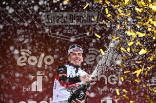 Tadej Pogacar celebrates his Strade Bianche win in 2022