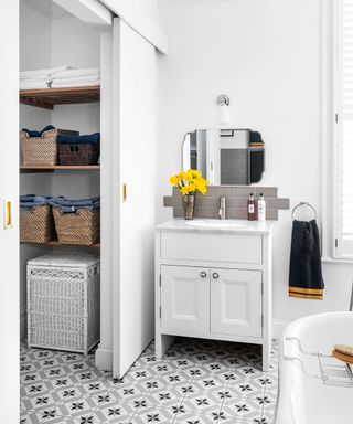 An example of how small bathroom ideas can be merged with a laundry room