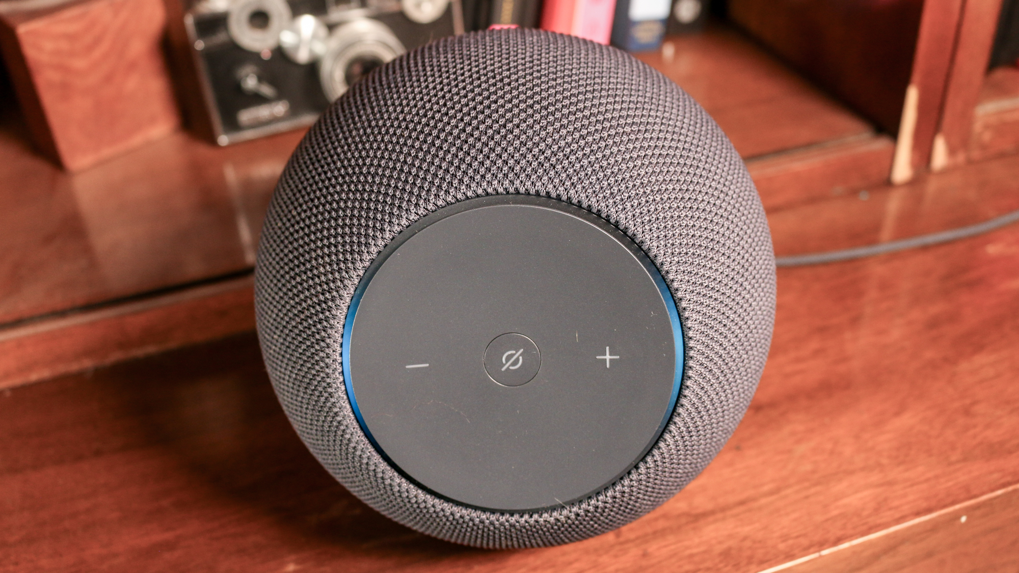 Amazon Echo Studio on a book shelf