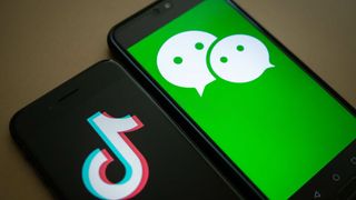 Two phones running TikTok and WeChat apps