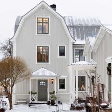 three storey swedish home exterior in the snow at the christmas