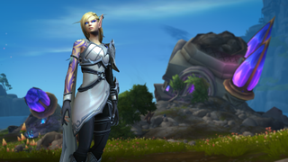 Alleria, an elf touched by the void, stands proud among the ruins of a familiar city in World of Warcraft: The War Within.