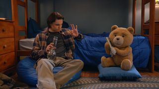 Max Burkholder as John talking to Ted in his bedroom