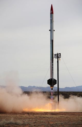 An Armadillo Aerospace rocket launches skyward in a Jan. 28, 2012 test flight from New Mexico’s Spaceport America.