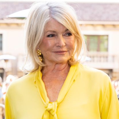 Martha Stewart in a yellow blouse