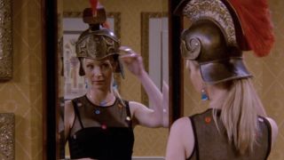 Phoebe trying on helmet in Friends